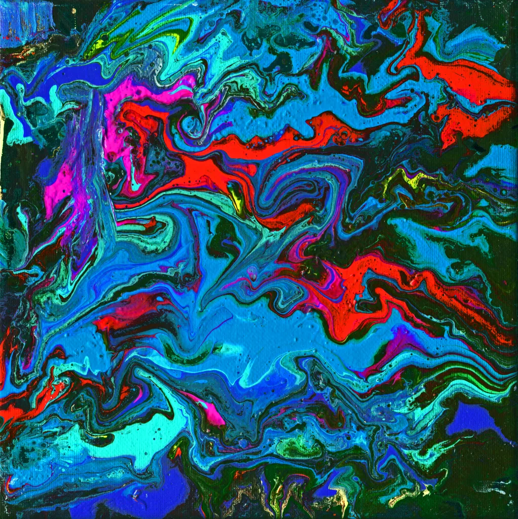 Brilliant swirls of blues, red, and magenta flow out of the nearly black background of green.